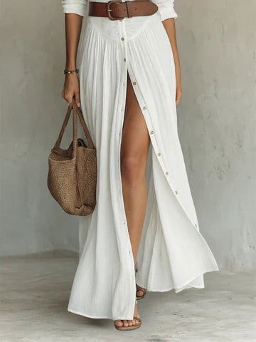 Vestido largo de lino con cuello de solapa con muesca y mangas largas.