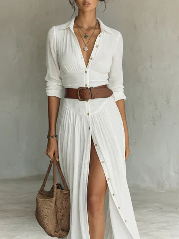 Vestido largo de lino con cuello de solapa con muesca y mangas largas.